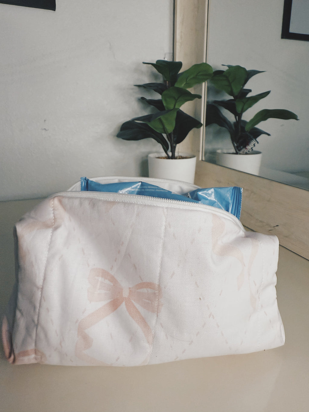 Promise pink bow print makeup bag