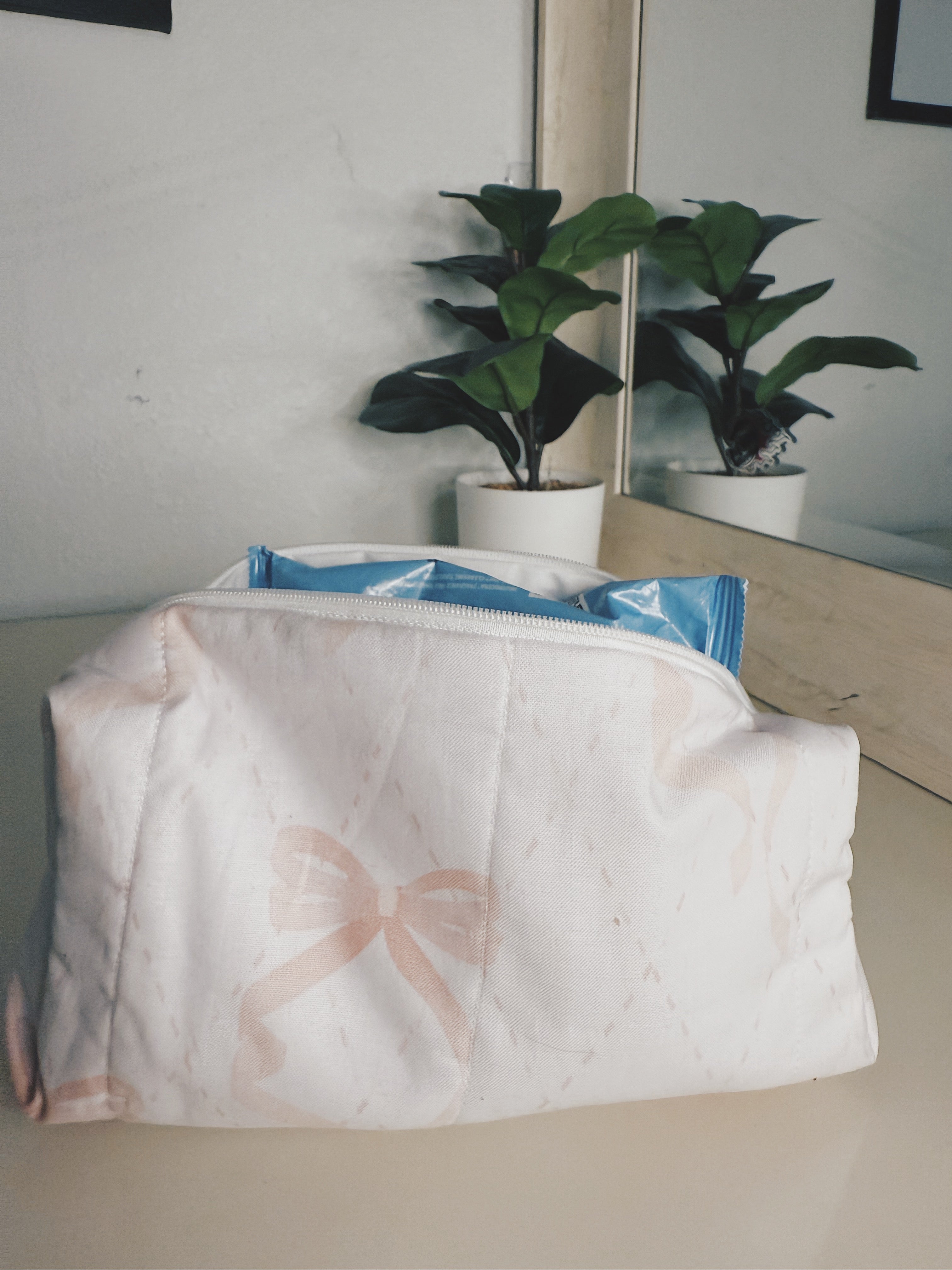 Promise pink bow print makeup bag